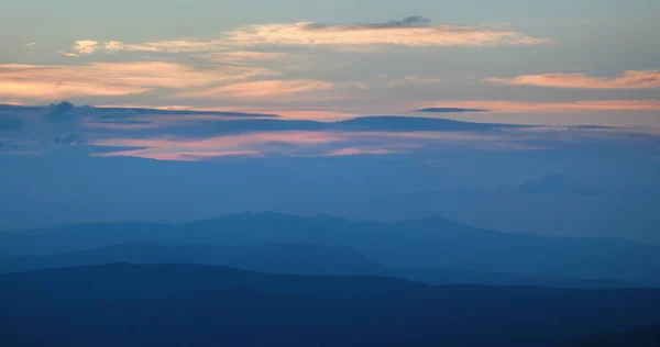 Scenic sunrise in the mountains, blue haze