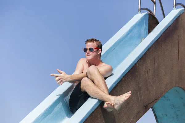 Teenager Pool Slide Summer Playtime — Stock Photo, Image