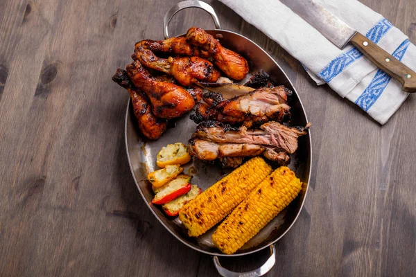 Plate with mixed bbq pork chicken corn — Stock Photo, Image