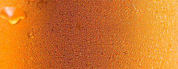 Gocce d'acqua su sfondo arancione — Foto Stock