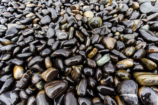 Pebble beach on background. — Stock Photo, Image