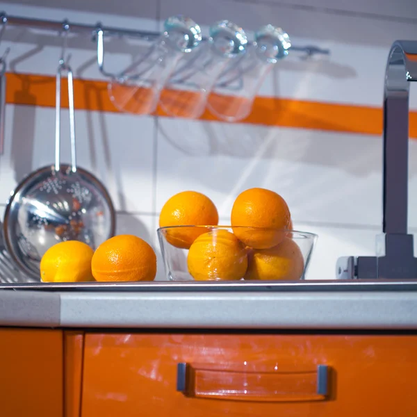 Oranges on the kitchen table — Stock Photo, Image