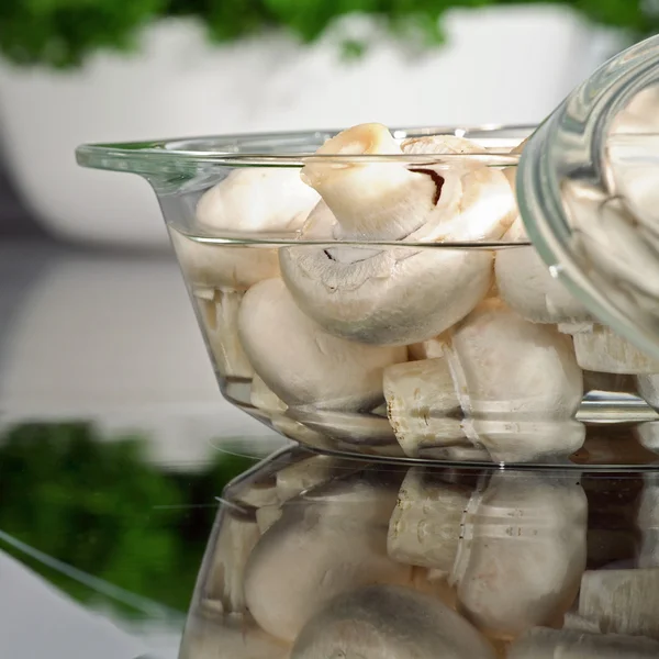 Mushrooms in glass bowl — Stock Photo, Image