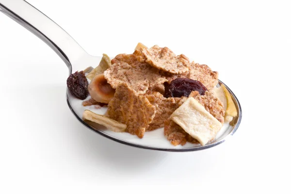 Muesli con frutas en primer plano cuchara de yogur aislado en bac blanco —  Fotos de Stock