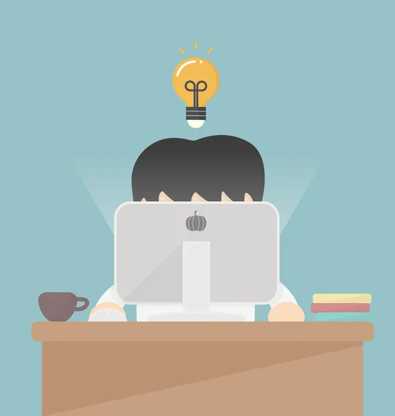 Bilgisayarda çalışan bir iş adamı..