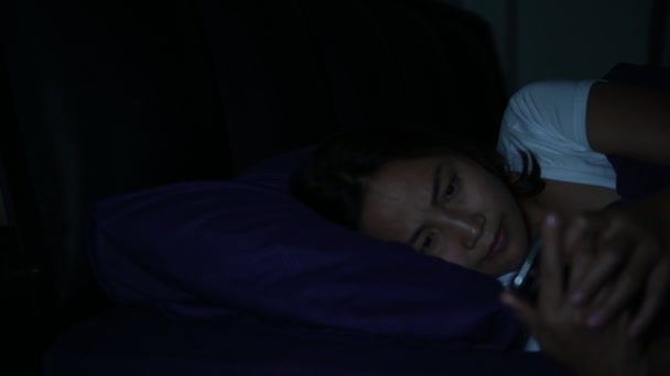 Asian Woman Playing Smartphone Bed Nighttime — Stock Video