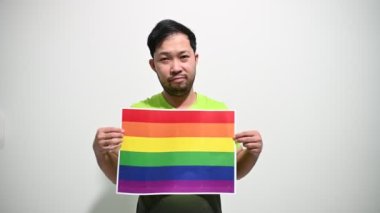 LGBT Onur Ayı konsepti, Asyalı yakışıklı erkek makyaj ve kadın kıyafeti, gay özgürlük günü 