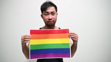 LGBT Onur Ayı konsepti, Asyalı yakışıklı erkek makyaj ve kadın kıyafeti, gay özgürlük günü 