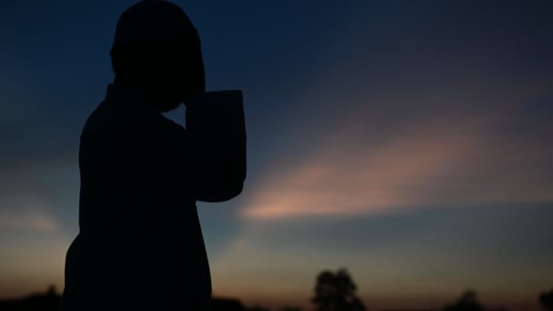 Young Asian Muslim Man Praying Sunset Background — Stock Video