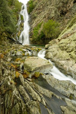 splash of Ovejuela in autumn in Las Hurdes. Extremadura clipart