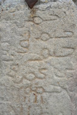 Writing on stone in the Alcazaba de Trujillo or Castillo de Trujillo is a fortress built between  centuries in the town of Trujillo in Caceres. Extremadura, Spain.