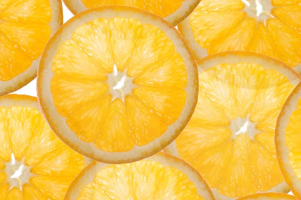 オレンジ背景のスライス — ストック写真