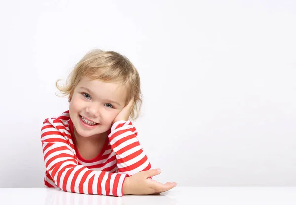 Caucasian Child Portrait Smiling Face Sitting Empty Space Table White — Stock Photo, Image