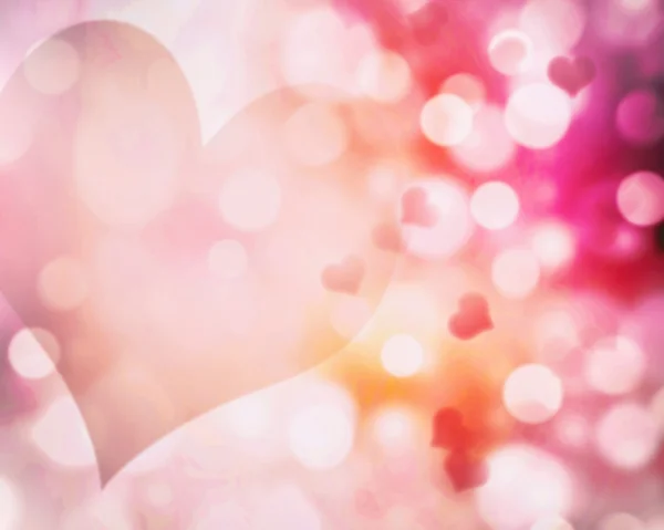 Alla hjärtans oskärpa rosa hjärtan bakgrund. Abstrakt bokeh nedanstående — Stockfoto
