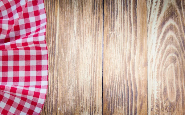 Tischdecke auf hölzernem Hintergrund. Fastfood-Konzept. — Stockfoto