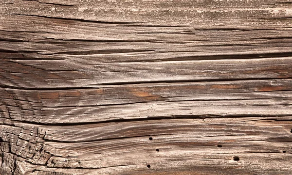 深色的木制背景 老旧开裂的木材的质地 — 图库照片