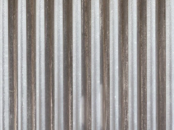 Old gray aluminum fence — Stock Photo, Image