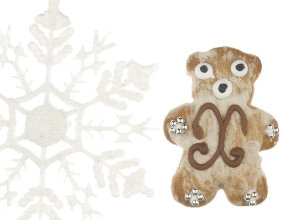 Funny gingerbread bear and snowflake — Stock Photo, Image