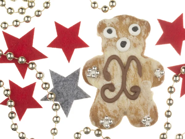 Пряничный медведь и яркие рождественские украшения — стоковое фото