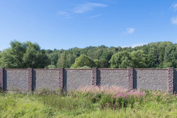 Brown stone fence — Stock Photo, Image