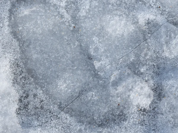 Brittle gray spring ice — Stock Photo, Image
