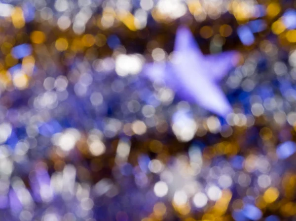 Blur abstraction with gold glitter — Stock Photo, Image