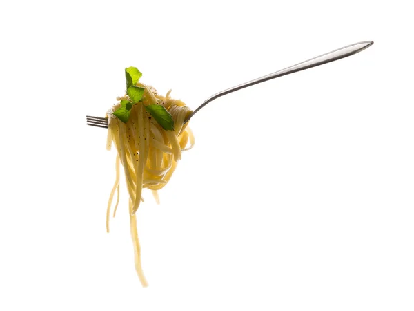 Pasta with basil leaves — Stock Photo, Image
