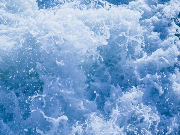 Chaotic splashes of sea foam — Stock Photo, Image