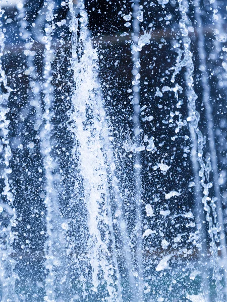 Beautiful splashes on a blue background — Stock Photo, Image