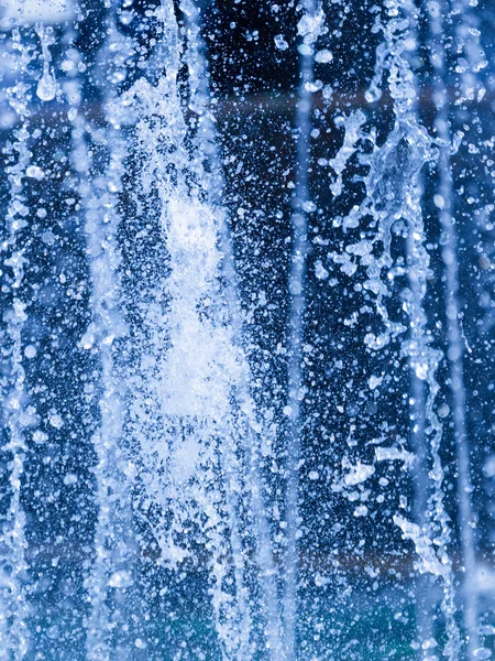 Splashes on a blue background — Stock Photo, Image