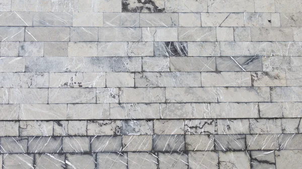 Facing the old wall variegated marble — Stock Photo, Image