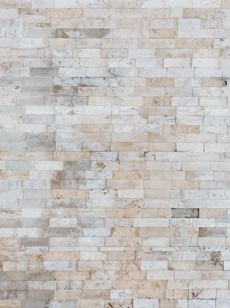 Beige wall made of natural travertine — Stock Photo, Image