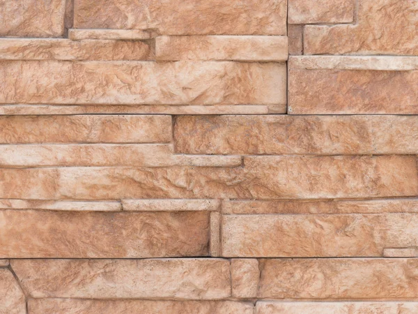 Wall of bright brown stone — Stock Photo, Image