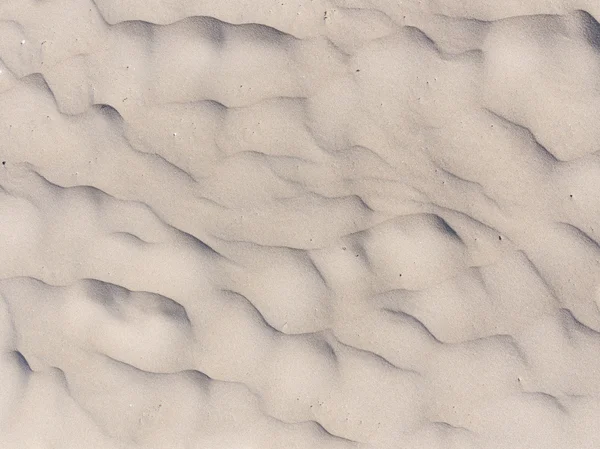 Волнистая поверхность песка — стоковое фото