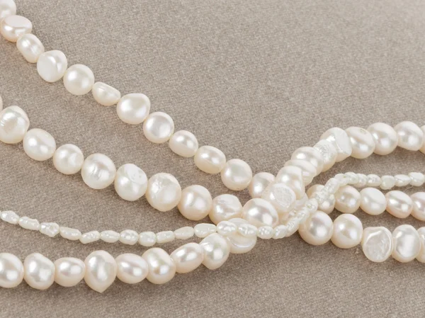 Pearl beads on velvet — Stock Photo, Image