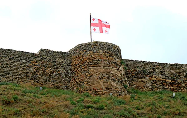 Georgian Flag Waving on the Gori Medieval Fortress, City of Gori, Shida Kartli Region, Georgia