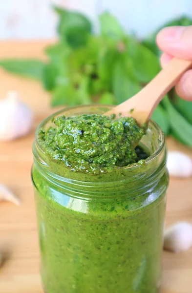 Spoon Scooping Vibrant Green Fresh Basil Pesto Sauce Atau Pesto — Stok Foto