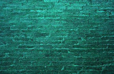 Pop art style pine green colored grunge brick wall for abstract background clipart