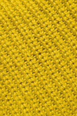 Closeup the Texture of Illuminating Yellow Alpaca Knitted Wool Fabric in Diagonal Patterns