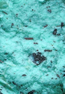 Closeup Mouthwatering Texture of Mint Chocolate Chip Ice Cream for Abstract Background
