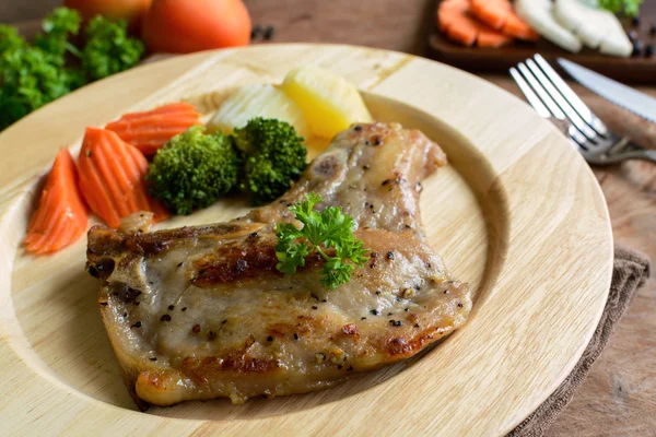 Kurobuta pork chop steak on wooden table — Stock Photo, Image