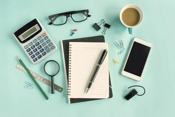 Blank notebook with cup of coffee on desk office — Stock Photo, Image