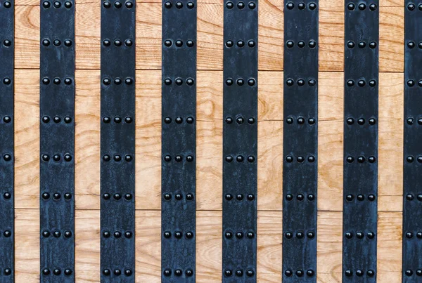 Old wooden and metal door background — Stock Photo, Image