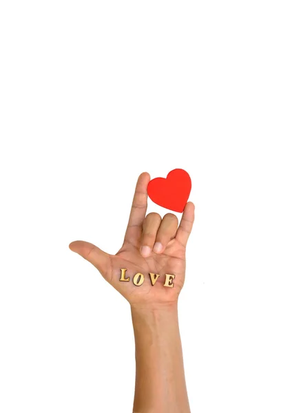 Hand met hart en letter "Love " — Stockfoto