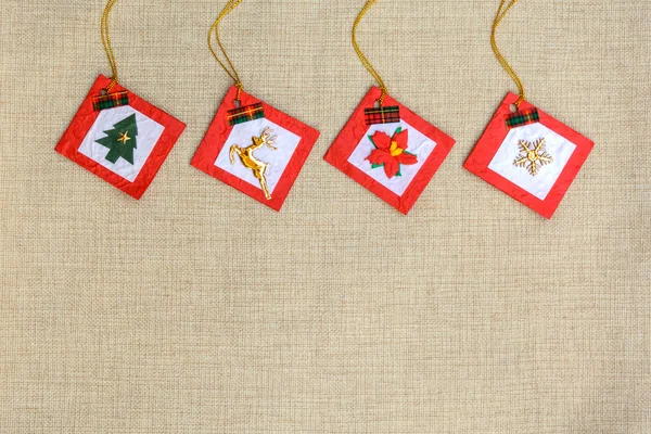 Christmas ornaments on sackcloth background — Stock Photo, Image