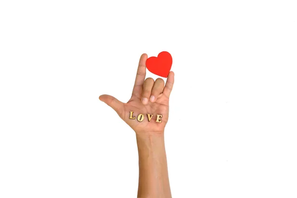 Χέρι με την καρδιά και το γράμμα "αγάπη" — Φωτογραφία Αρχείου