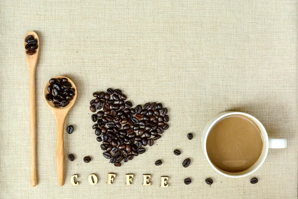 Filiżanka kawy i fasoli — Zdjęcie stockowe