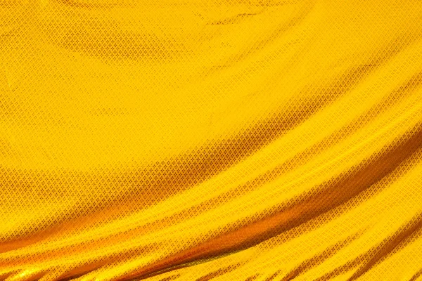 Gold crumpled silk fabric textured — Stock Photo, Image