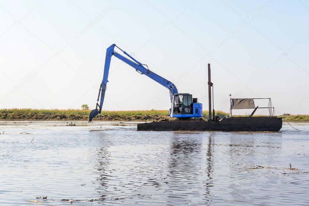 excavator working in the river