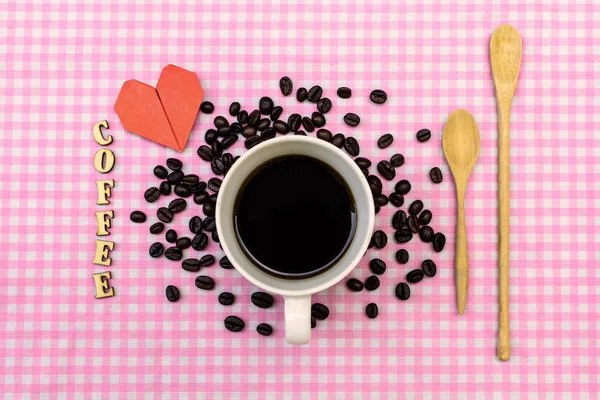 Taza de café con grano de café —  Fotos de Stock